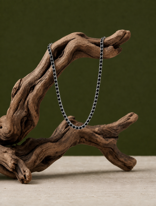 Charle Necklace 13.5 CT by ADAM moissanite necklace in sterling silver with black oval stones on driftwood